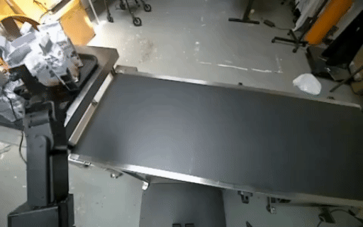 A robot performs the corresponding packaged-goods handling task